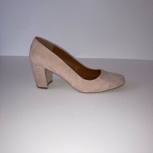 Pink suede pumps